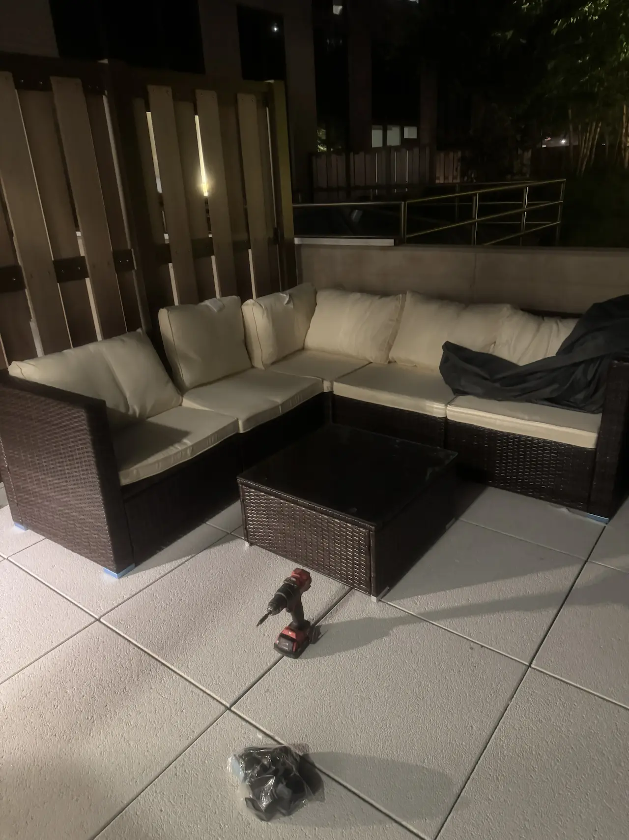 Outdoor rattan sectional sofa assembled level with aligned modules and cushions — Manhattan terrace