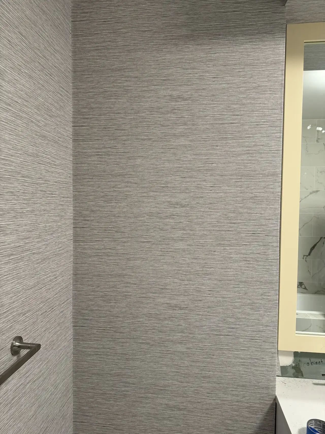 Grasscloth wallpaper with tight inside corner and aligned texture — NYC powder room